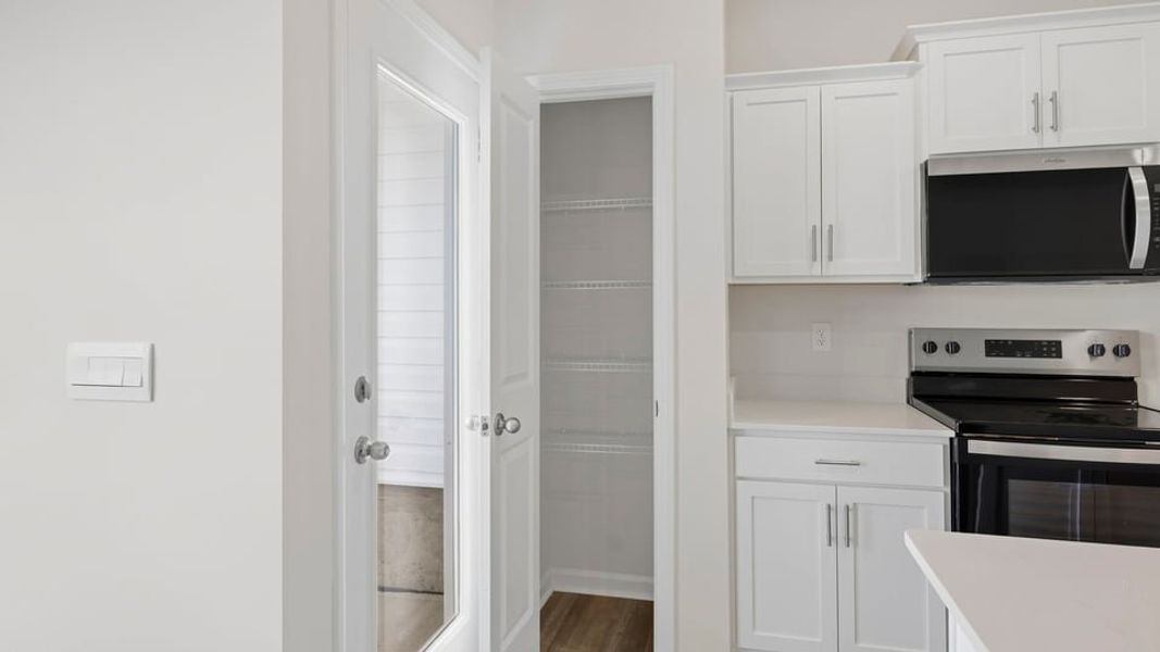 Furnished interior view inside a new home in Tanglewood Townes, Greenville (Image 11).