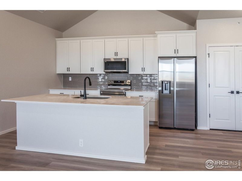 Furnished interior view inside a new home in Raindance Condos, Windsor (Image 5).