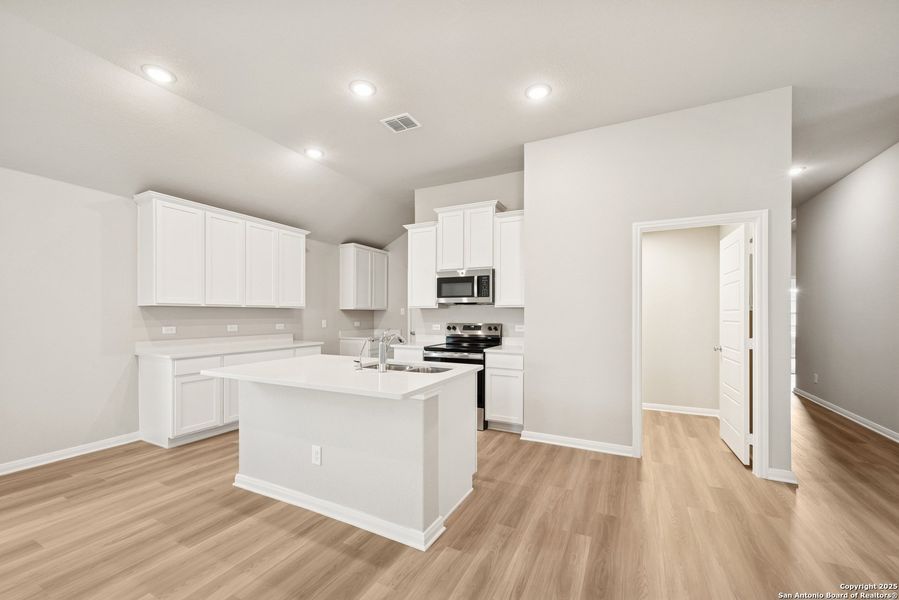 Furnished interior view inside a new home in Greenspoint Heights, Seguin (Image 6).