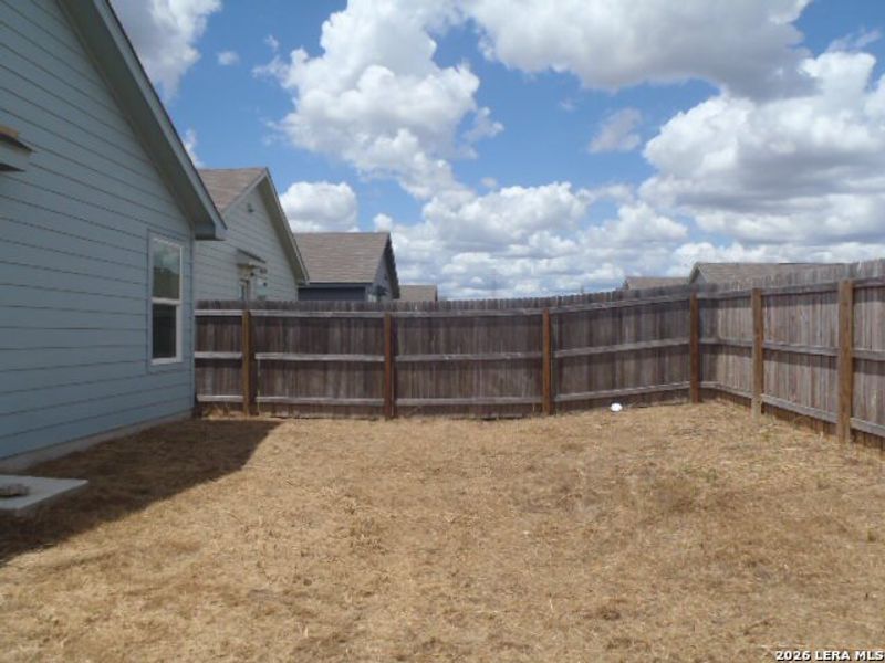 Exterior details and patio area of a home in Navarro Ranch, Seguin (Image 17). Exterior details and patio area of a home in Navarro Ranch, Seguin (Image 17).