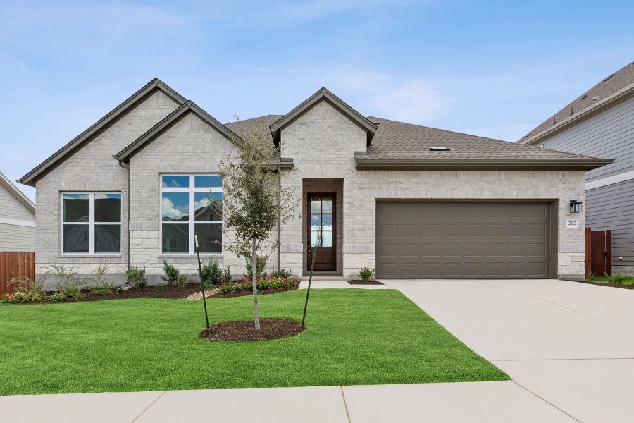 Representative exterior photo of a completed home built from the The Touchstone by David Weekley Homes in Sunfield, Buda, TX (Image 2). Representative exterior photo of a completed home built from the The Touchstone by David Weekley Homes in Sunfield, Buda, TX (Image 2).