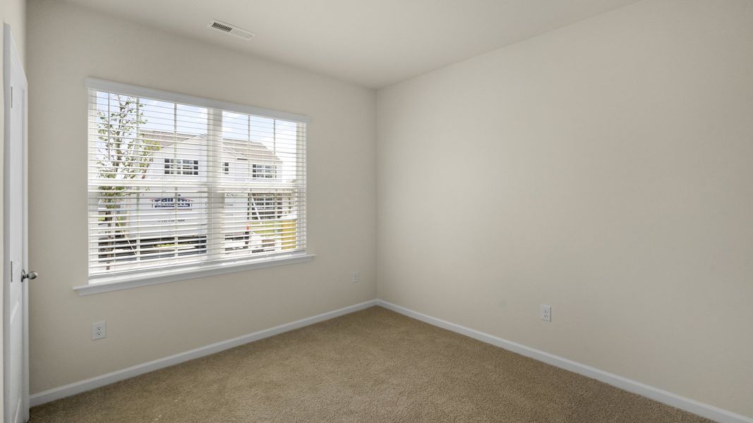 Spacious, unfurnished interior of a new home in The Grove at Matthews Landing, Fuquay Varina (Image 16).