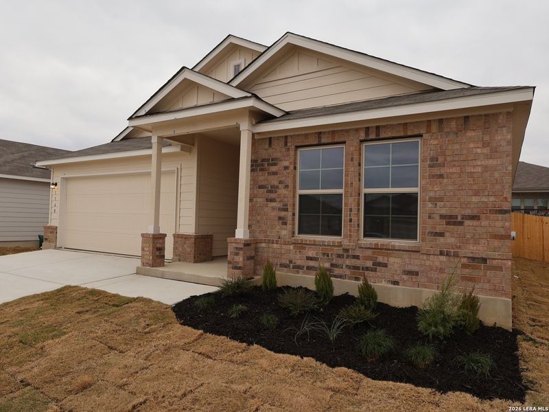 Front exterior of a new home in Greenspoint Heights, Seguin, TX, highlighting curb appeal (Image 23).