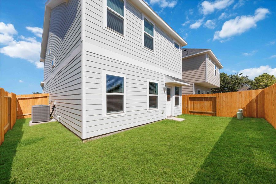 Exterior details and patio area of a home in , Houston (Image 4).