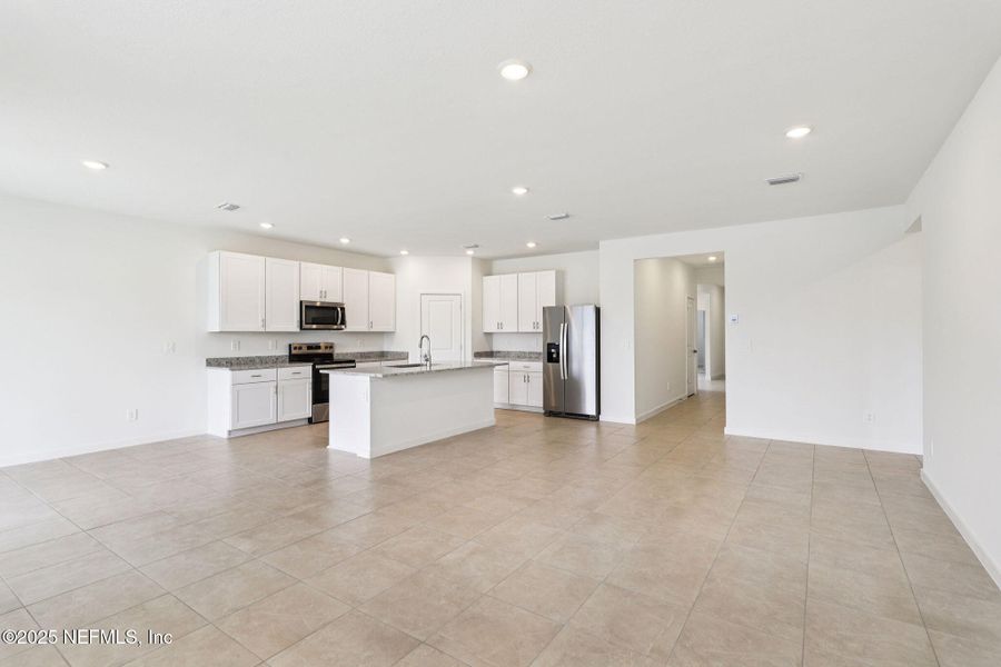 Spacious, unfurnished interior of a new home in Lakes at Bella Lago - Signature Series, Green Cove Springs (Image 13).