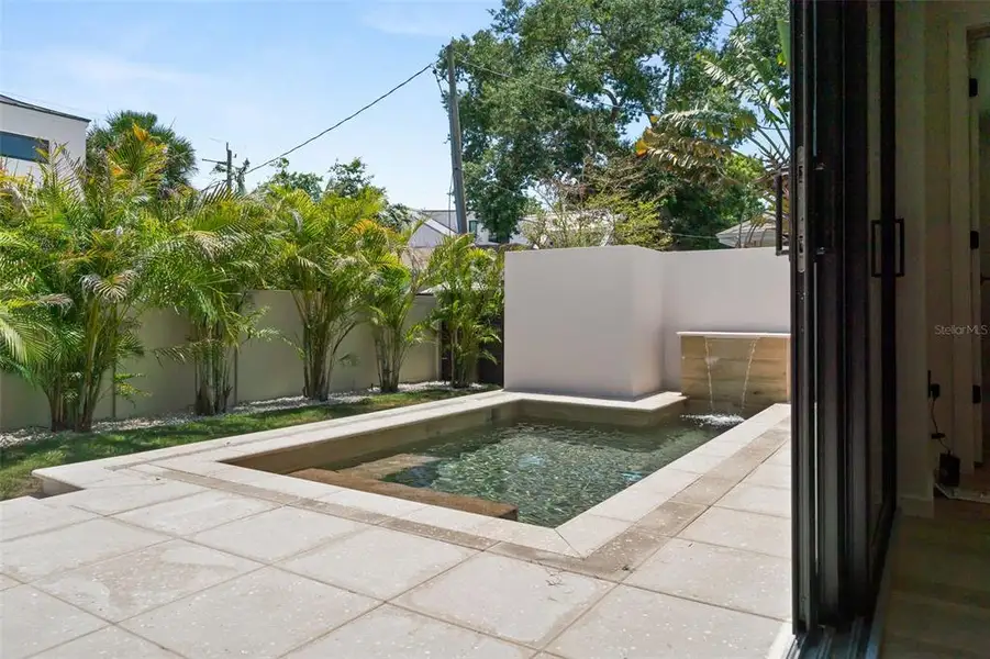Exterior details and patio area of a home in , Sarasota (Image 37).