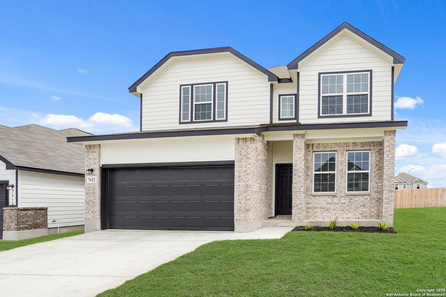 Front exterior of a new home in Cinco Lakes, San Antonio, TX, highlighting curb appeal (Image 18). Front exterior of a new home in Cinco Lakes, San Antonio, TX, highlighting curb appeal (Image 18).