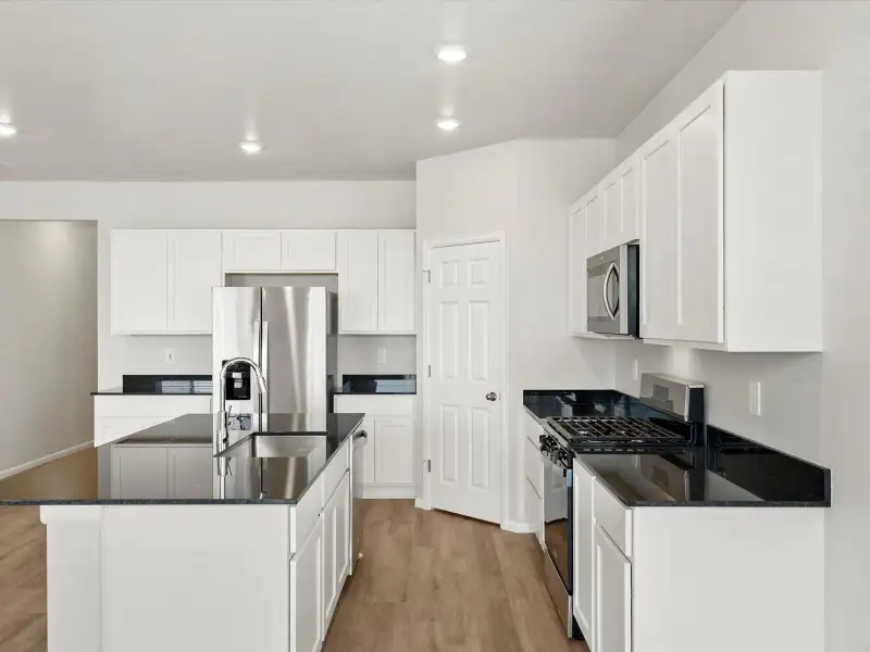 Furnished interior view inside a new home in Poudre Heights: The Lakes Collection, Windsor (Image 3).
