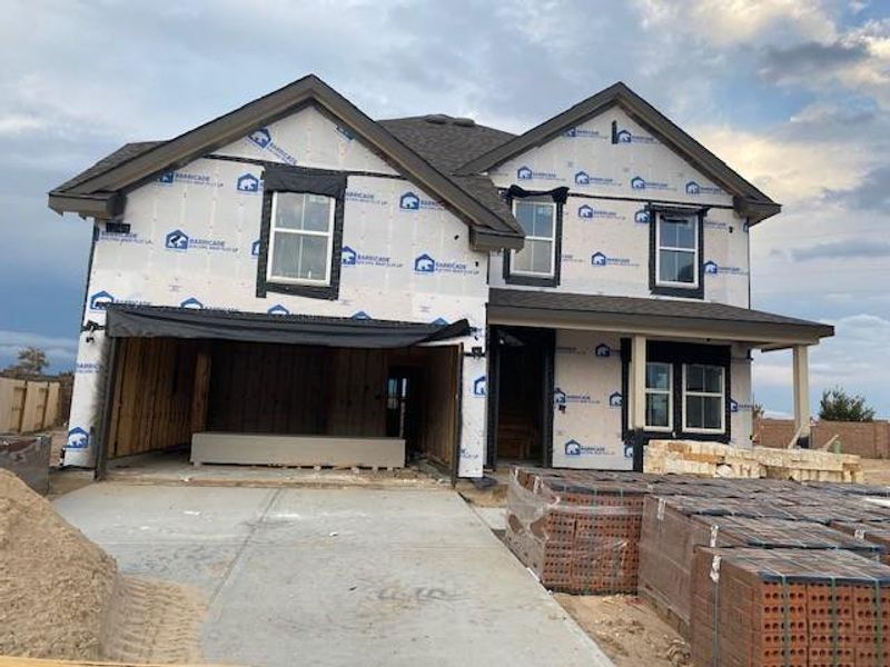 Two story home with 4 beds, 3.5 baths, and 2 car garage