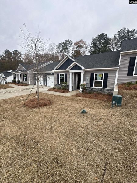 Exterior details and patio area of a home in Piney Woods Bluff, Columbia (Image 2). Exterior details and patio area of a home in Piney Woods Bluff, Columbia (Image 2).
