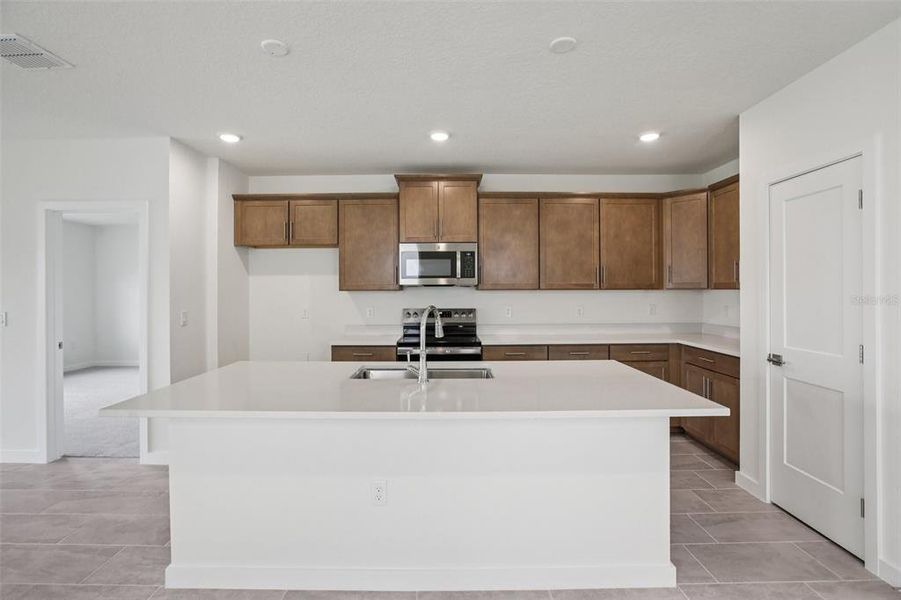Furnished interior view inside a new home in Grasslands West, Lakeland (Image 14).