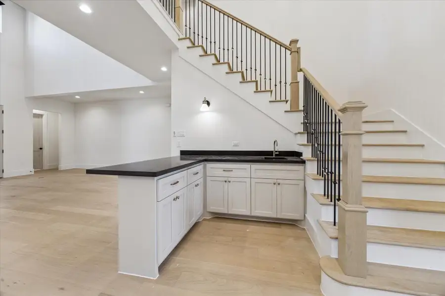 Bar overlooking living area making entertaining a breeze! Bar overlooking living area making entertaining a breeze!