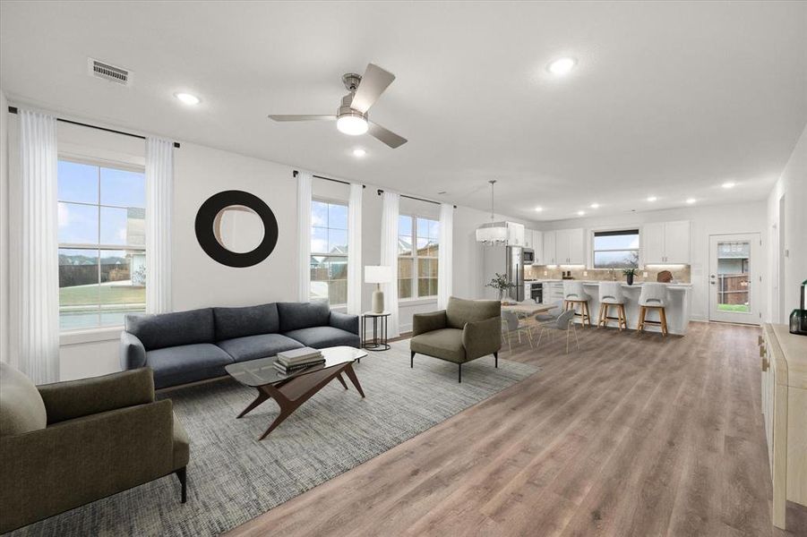 This room has been virtually staged for you to see the wonderful open concept possibilities.