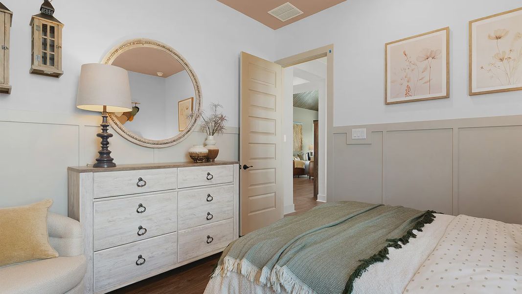 Representative furnished interior of a home built from the Silas by Chesmar Homes in Crescent Bluff, Georgetown (Image 28).