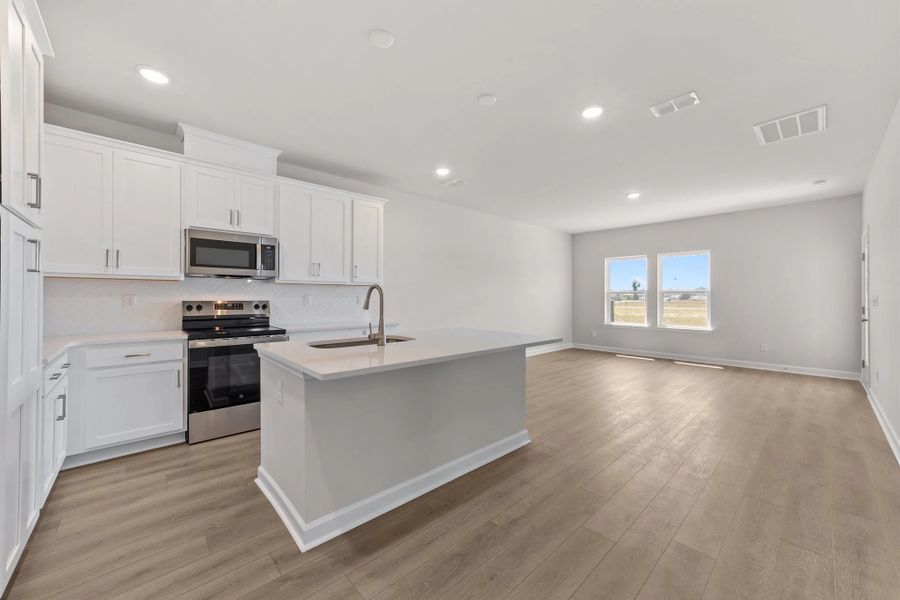 Furnished interior view inside a new home in Blue Heron Retreat, Little River (Image 6).