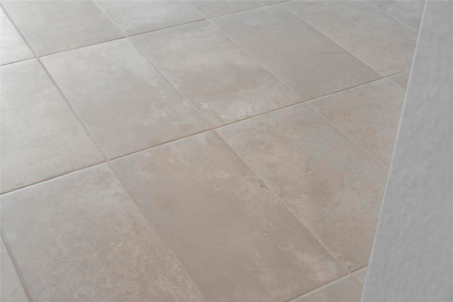 Urbanize White 12x24 tile flooring.