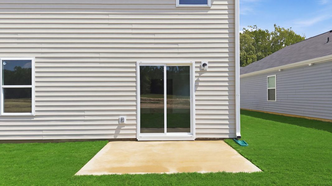 Exterior details and patio area of a home in Carter Ridge, Greenville (Image 20).