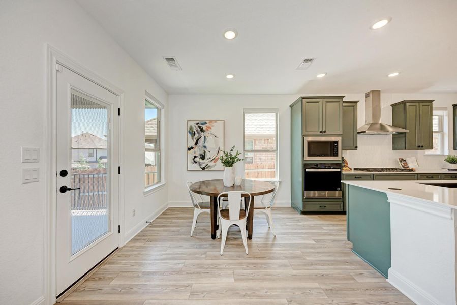 Plenty of natural light in the kitchen, Back door leading to the covered patio