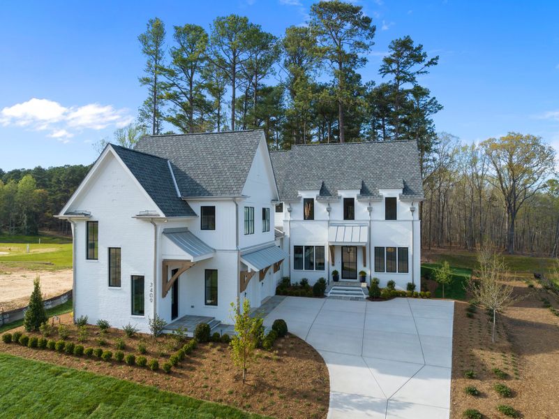 Representative exterior photo of a completed home built from the Eloise by Homes by Dickerson in The Founding at Blue Ridge, Raleigh, NC (Image 28). Representative exterior photo of a completed home built from the Eloise by Homes by Dickerson in The Founding at Blue Ridge, Raleigh, NC (Image 28).