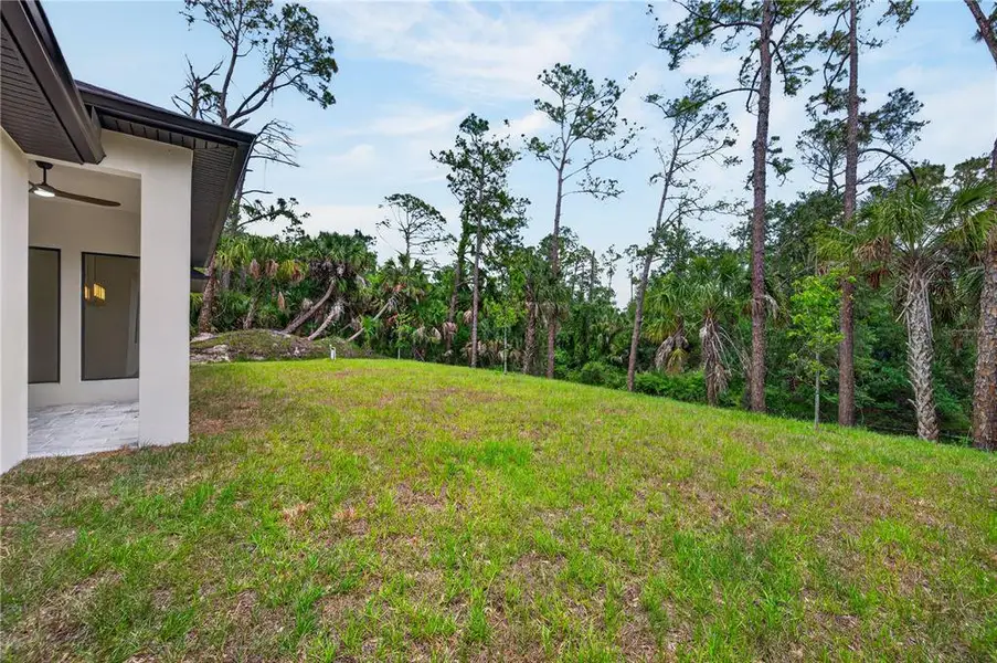 Exterior details and patio area of a home in , North Port (Image 41).
