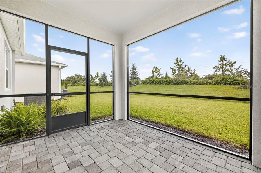 Exterior details and patio area of a home in Windwater, Parrish (Image 18).