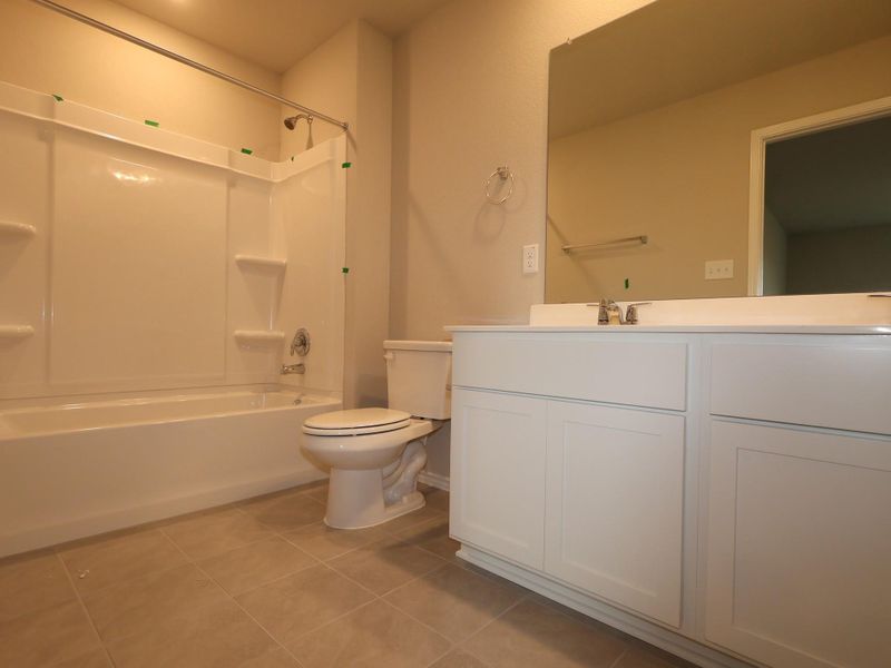 Furnished interior view inside a new home in Carillon, Manor (Image 3).