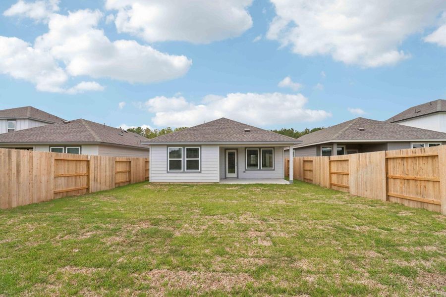Front exterior of a new home in Landing Meadows - Traditional Series, New Caney, TX, highlighting curb appeal (Image 20). Front exterior of a new home in Landing Meadows - Traditional Series, New Caney, TX, highlighting curb appeal (Image 20).