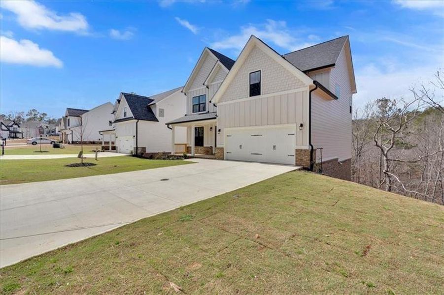 Front exterior of a new home in , Cartersville, GA, highlighting curb appeal (Image 19).