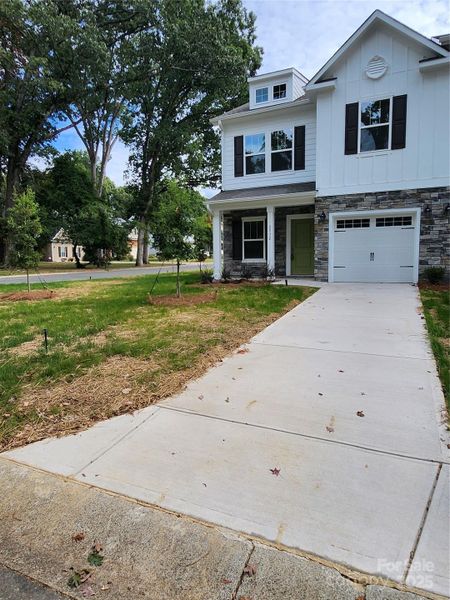 Front exterior of a new home in , Charlotte, NC, highlighting curb appeal (Image 2).