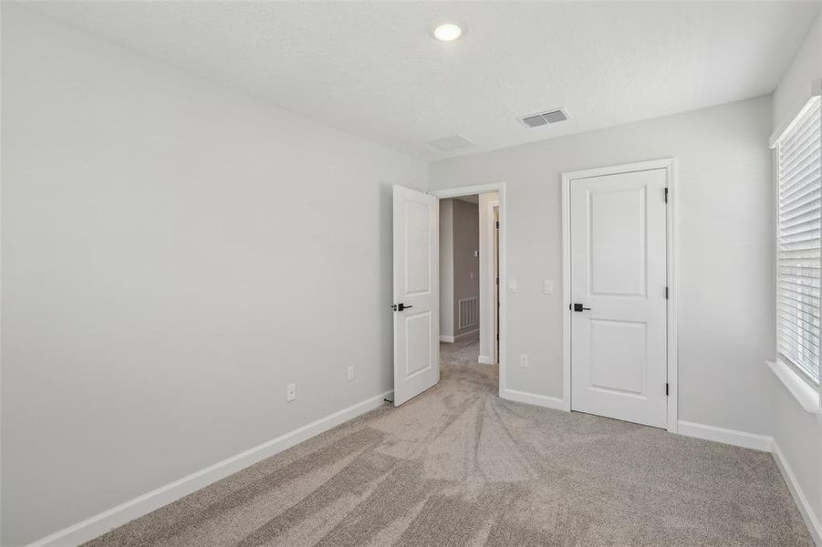 Spacious, unfurnished interior of a new home in Montague Chase, Tampa (Image 15).