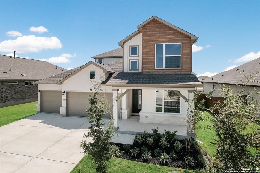 Front exterior of a new home in Foxbrook, Cibolo, TX, highlighting curb appeal (Image 21).