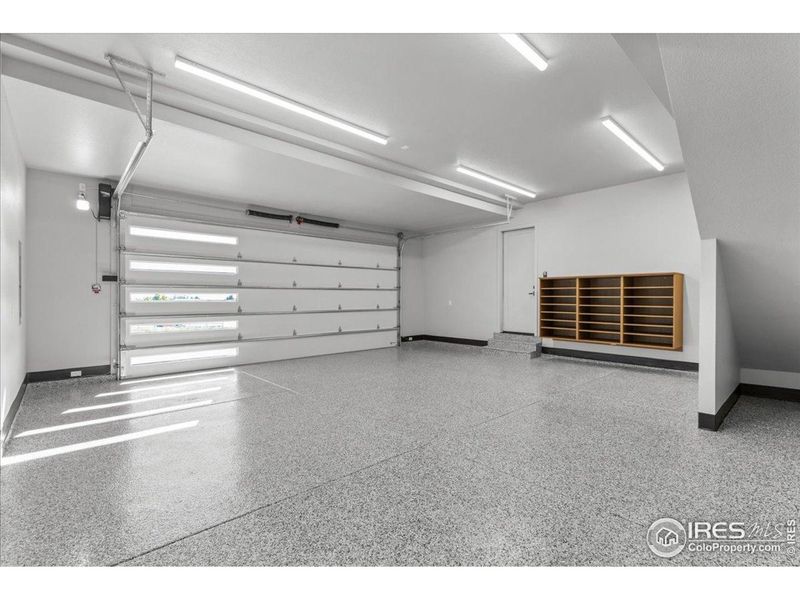 Addtional oversized 2 car garage w/ custom shoe storage.  715sqft.  Not shown is two additional storage areas for lawn equipment