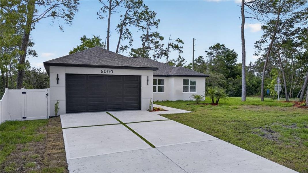 Front exterior of a new home in , Spring Hill, FL, highlighting curb appeal (Image 28).