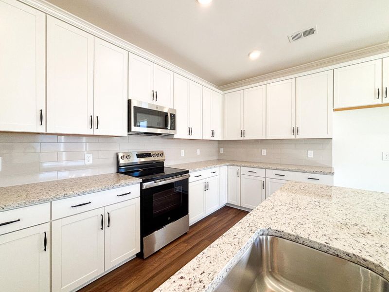 Furnished interior view inside a new home in Harrington, Greenville (Image 5).