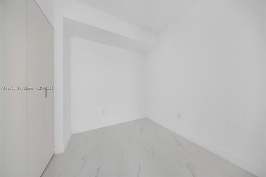 Spacious, unfurnished interior of a new home in Aria Reserve, Miami (Image 32). Spacious, unfurnished interior of a new home in Aria Reserve, Miami (Image 32).