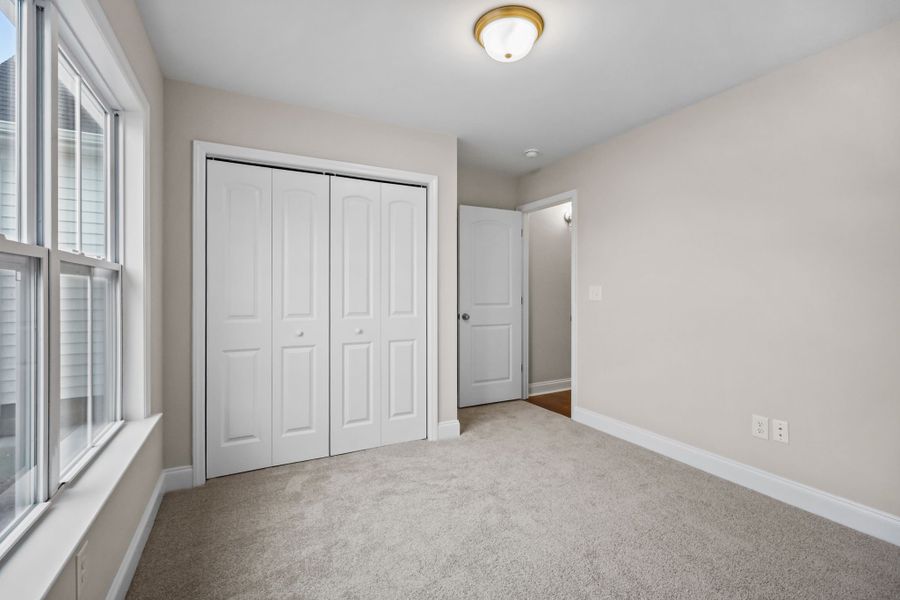 Spacious, unfurnished interior of a new home in Davenport Farms, Winterville (Image 39).