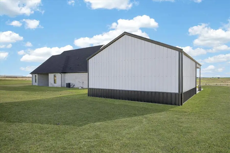 Exterior details and patio area of a home in , Celeste (Image 3).