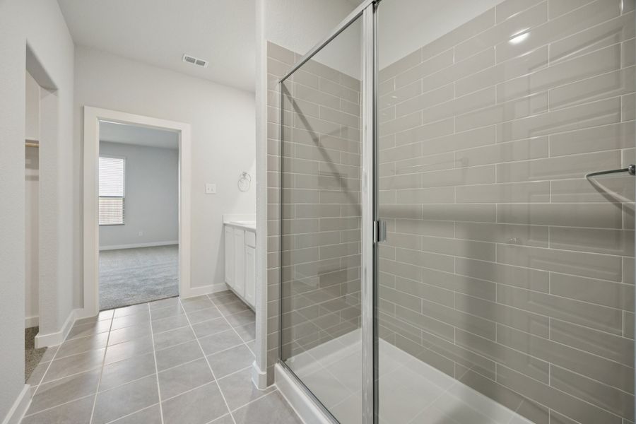 Primary Bathroom in the Haylee home plan by Trophy Signature Homes - REPRESENTATIVE PHOTO Primary Bathroom in the Haylee home plan by Trophy Signature Homes - REPRESENTATIVE PHOTO
