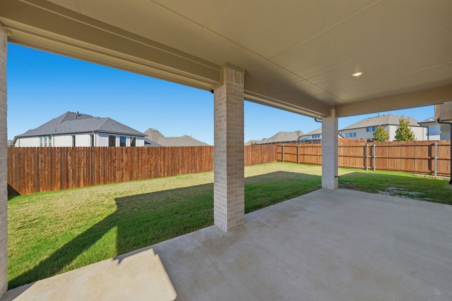 Exterior details and patio area of a home in Tavolo Park, Fort Worth (Image 3). Exterior details and patio area of a home in Tavolo Park, Fort Worth (Image 3).