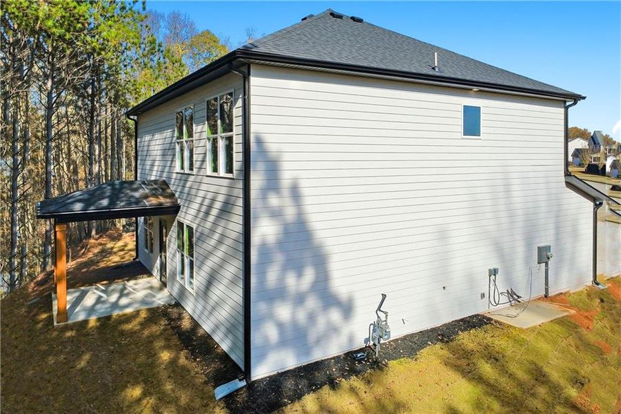 Exterior details and patio area of a home in , Hampton (Image 3).