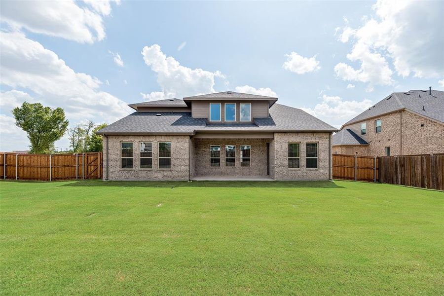 Front exterior of a new home in Villages of Hurricane Creek, Anna, TX, highlighting curb appeal (Image 18). Front exterior of a new home in Villages of Hurricane Creek, Anna, TX, highlighting curb appeal (Image 18).