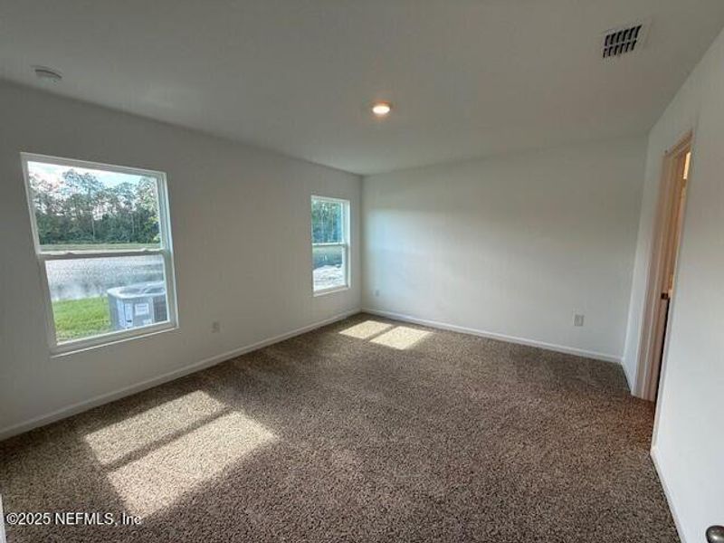 Spacious, unfurnished interior of a new home in Grand Reserve, Bunnell (Image 30).