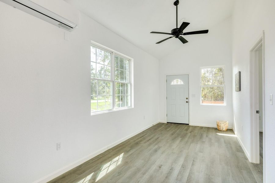 Bright and cozy living space with natural light and an open layout.