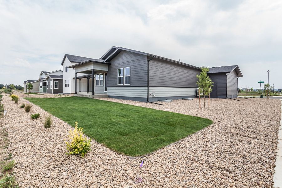 Exterior details and patio area of a home in Prairie Song, Windsor (Image 35).