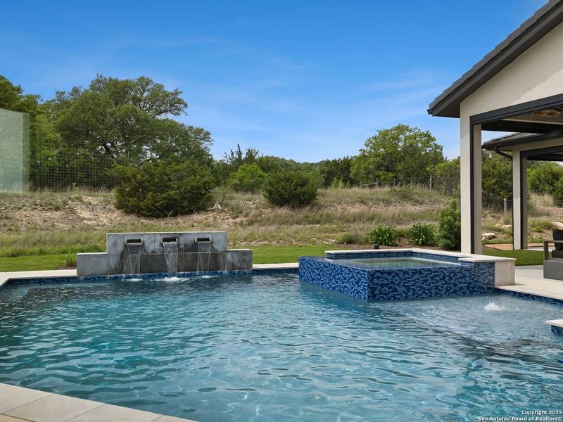 Front exterior of a new home in , Boerne, TX, highlighting curb appeal (Image 26).