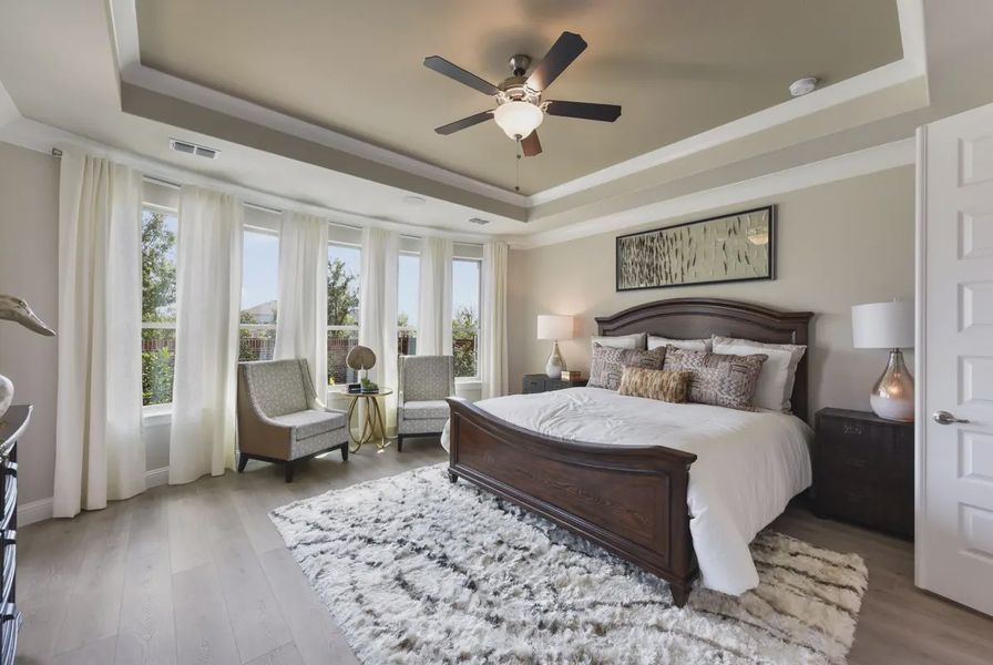 Representative furnished interior of a home built from the Waylon by Chesmar Homes in 6 Creeks, Kyle (Image 8).
