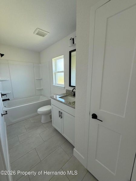 Furnished interior view inside a new home in Winding Oaks, Weeki Wachee (Image 5).