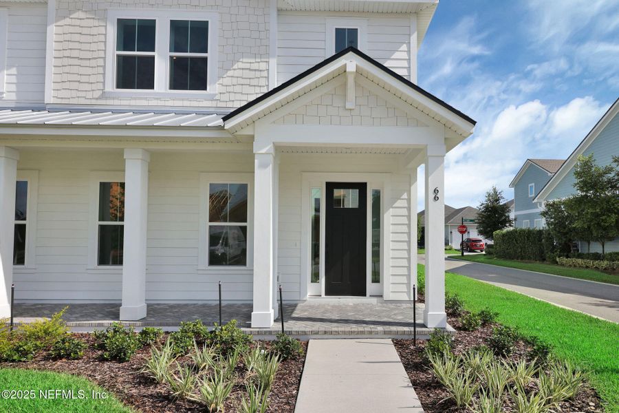 Front exterior of a new home in Seabrook Village at Seabrook, Nocatee, FL, highlighting curb appeal (Image 2). Front exterior of a new home in Seabrook Village at Seabrook, Nocatee, FL, highlighting curb appeal (Image 2).