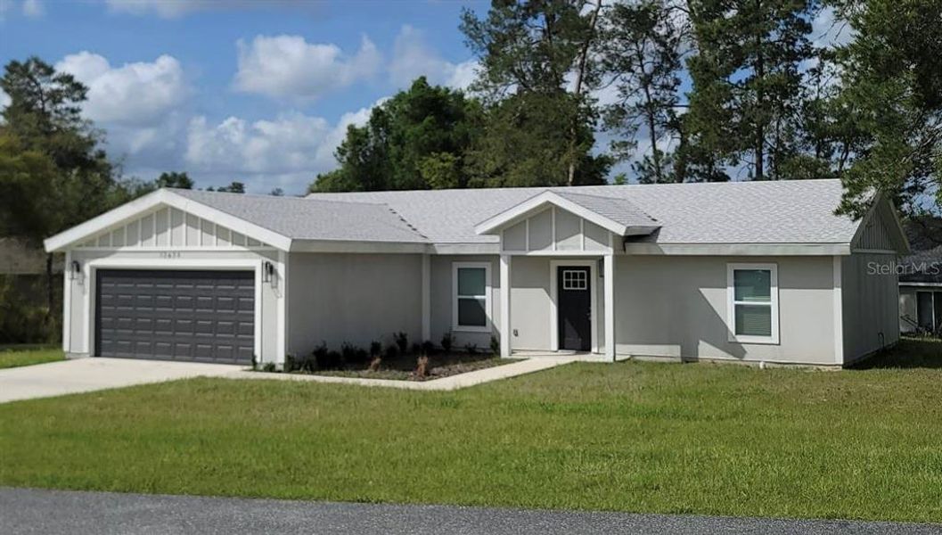 Front exterior of a new home in , Ocala, FL, highlighting curb appeal (Image 1). Front exterior of a new home in , Ocala, FL, highlighting curb appeal (Image 1).