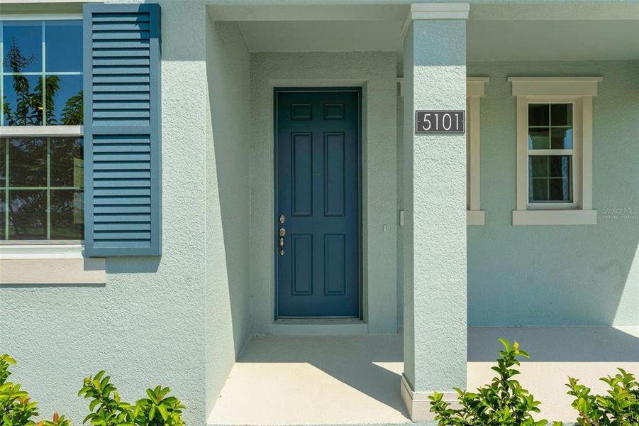 Exterior details and patio area of a home in Crossroads at Kelly Park, Apopka (Image 3).